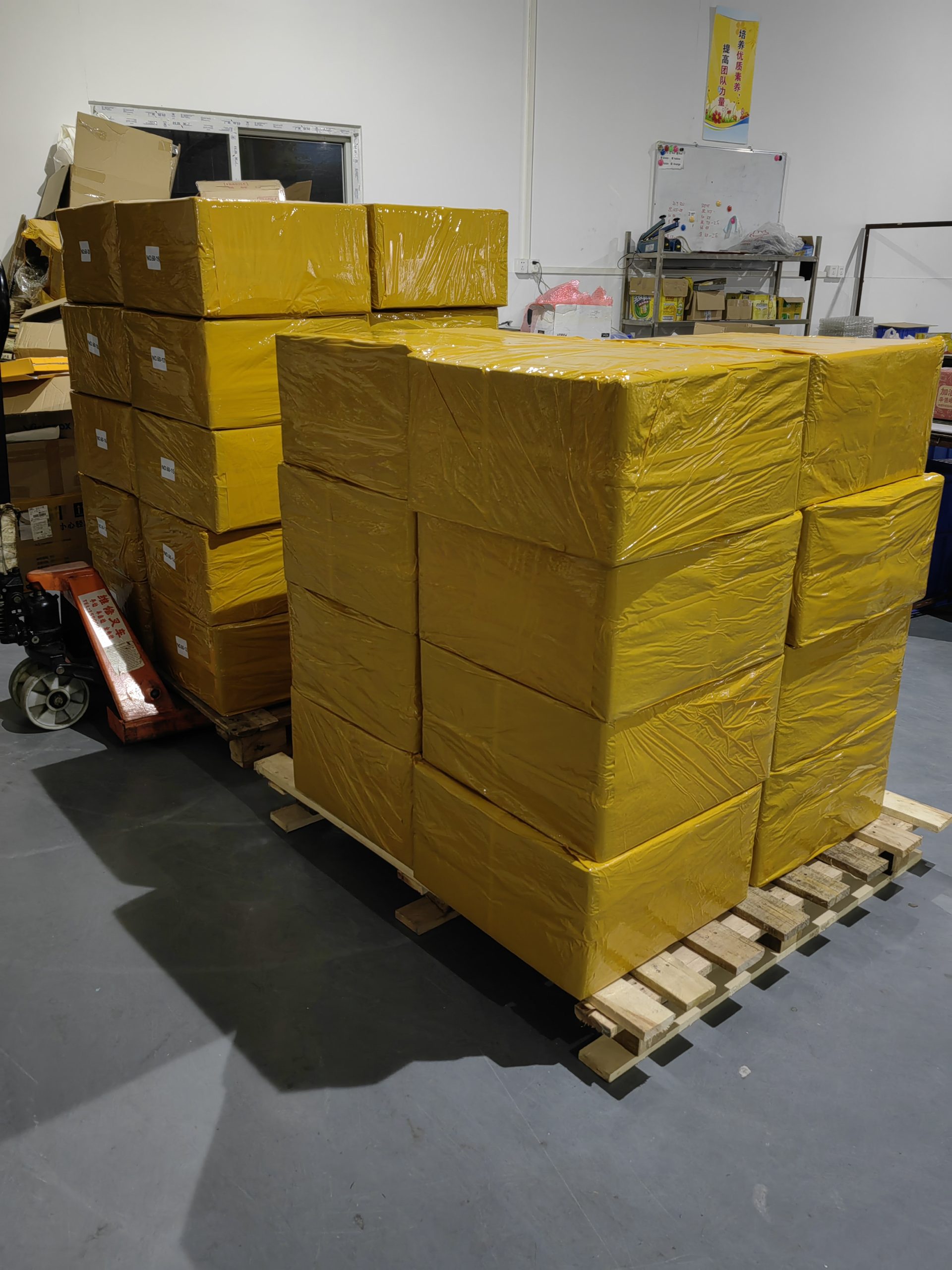 Packed cartons on a pallet ready for shipment at Honghui Tech